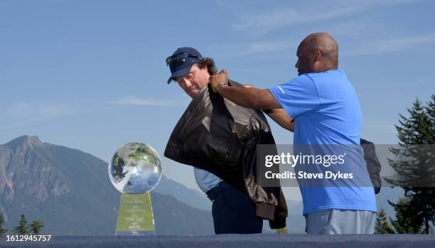 Stephen Ames of Canada is presented with a 'Bomber' jacker after winning the Boeing Classic at The Club at Snoqualmie Ridge on August 13, 2023 in...