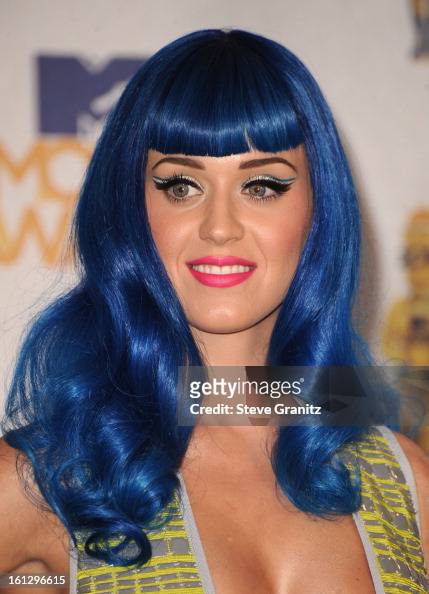 Katy Perry poses in the press room at the 2010 MTV Movie Awards at ...