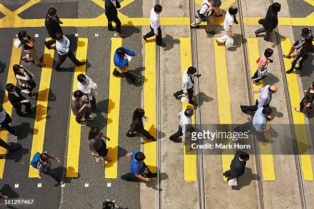 people on zebra crossing, hong kong - traffic crossing stock pictures, royalty-free photos & images