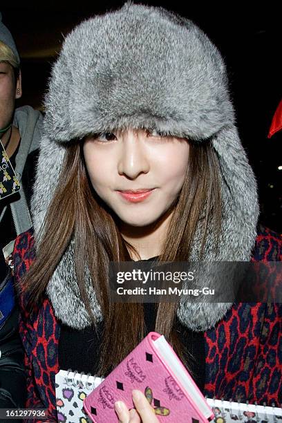 Dara of South Korean girl group 2NE1 is seen at Gimpo International Airport on February 9, 2013 in Seoul, South Korea.