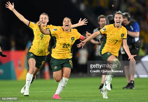Sam Kerr, Caitlin Foord and Steph Catley of Australia celebrate the team’s victory through the penalty shoot out following the FIFA Women's World Cup...