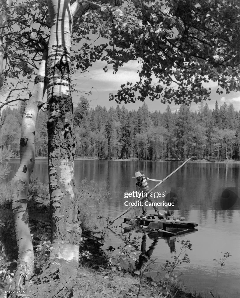 Boy On Raft