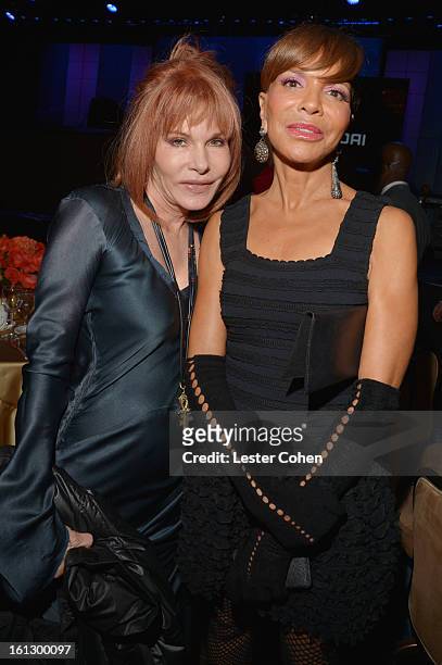 Music supervisor Kathy Nelson and music executive Sylvia Rhone attend the 55th Annual GRAMMY Awards Pre-GRAMMY Gala and Salute to Industry Icons...
