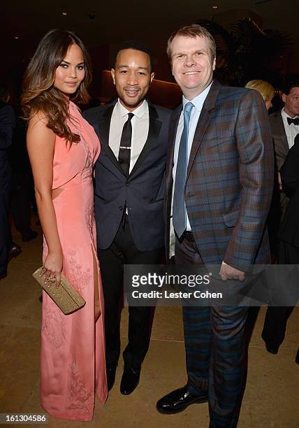 Model Christine Teigen, singer John Legend and Chairman/CEO of Columbia Records Rob Stringer arrive at the 55th Annual GRAMMY Awards Pre-GRAMMY Gala...