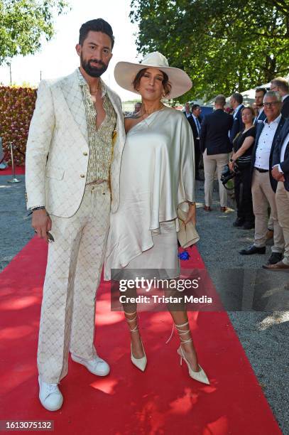 Sebastian Fobe and his girlfriend Liza Waschke during the Audi Ascot race day at race track Neue Bult on August 20, 2023 in Hanover, Germany.