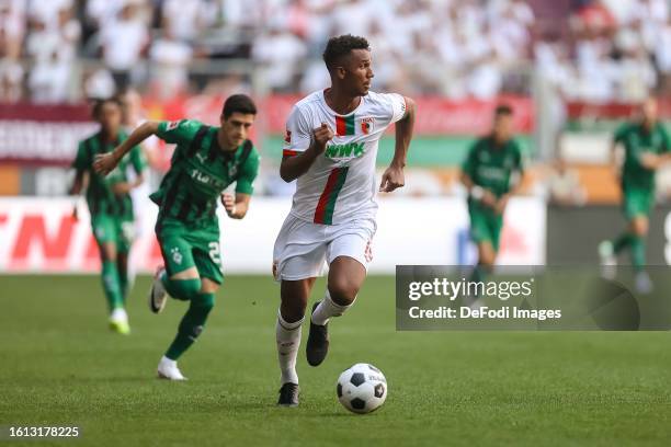 Felix Uduokhai of FC Augsburg controls the ball during the Bundesliga match between FC Augsburg and Borussia Mönchengladbach at WWK-Arena on August...