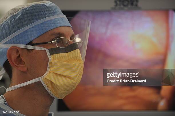 CdXXobese_bb_1 -- Dr. Matthew Metz performs a Laparoscopic Gastric Band surgery at Presbyterian/St. Luke's Hospital. He has been seeing patients who...