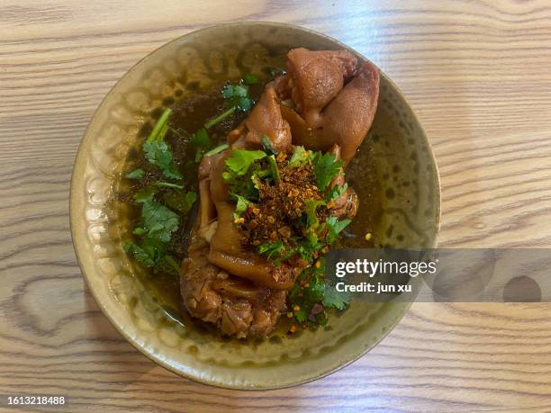 delicious marinated pork trotters - trotter stock pictures, royalty-free photos & images