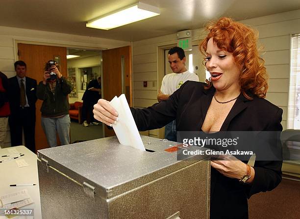 Georgetown Mayor Koleen Brooks casts her ballot, which features the issue of her recall as well as a choice for other selectmen candidates, on...