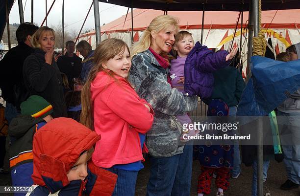 Golden, Colo., May 1, 2002 -- Visitors to a circus at Heritage Square in Golden react to the arrival of an elephant Wednesday afternoon. Danielle...