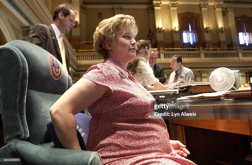 Pam Rhodes May 5, 2004-Colorado House Representative Pam Rhodes works while ...
