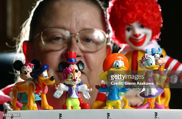Caron <cq> Lawless <cq> displays a just a small percentage of her total McDonald's Happy Meal figurine collection she owns. This collection in this...