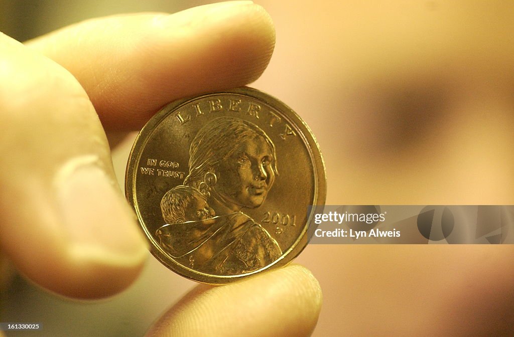 DENVER,COLORADO, DEC. 7, 2004-The Sacagawea Dollar , 2001D (only this coin) , can be purchased from a change machine at the Denver Mint's visitors center at East Colfax Ave. and Cherokee Street ( 320 West Colfax Ave.). Joe Yocum <cq> , from Lexington, Ken