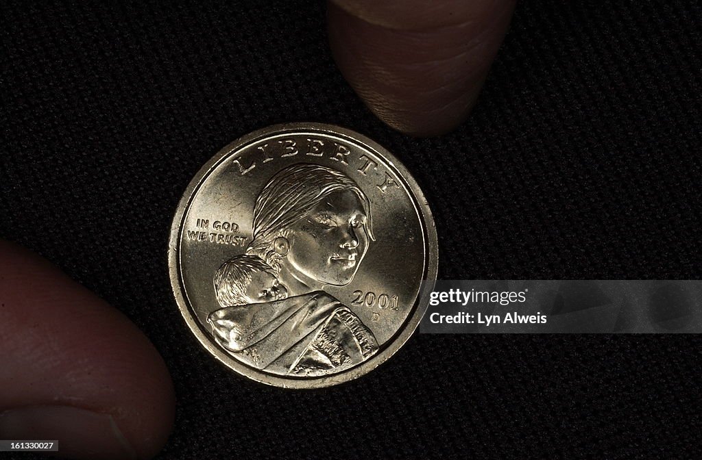 DENVER,COLORADO, DEC. 7, 2004-The Sacagawea Dollar , 2001D (only this coin) , can be purchased from a change machine at the Denver Mint's visitors center at East Colfax Ave. and Cherokee Street ( 320 West Colfax Ave.). Joe Yocum <cq> , from Lexington, Ken
