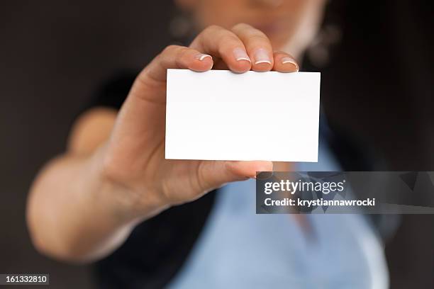 leere visitenkarte - person holding blank sign stock-fotos und bilder