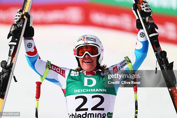 Marion Rolland of France reacts in the finish area after skiing in the Women's Downhill during the Alpine FIS Ski World Championships on February 10,...