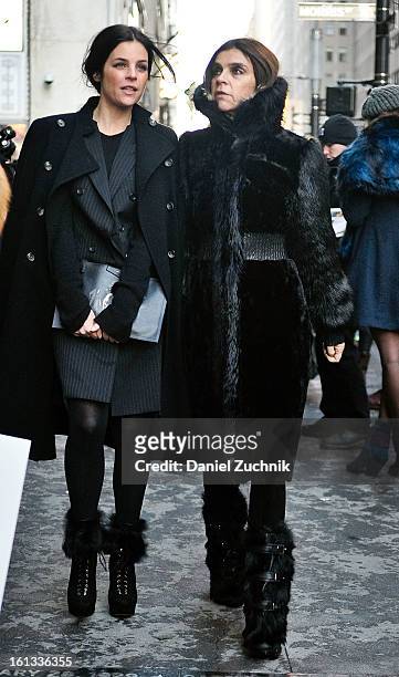 Julia Restoin Roitfeld and Carine Roitfeld arrive to the Alexander Wang show on February 9, 2013 in New York City.