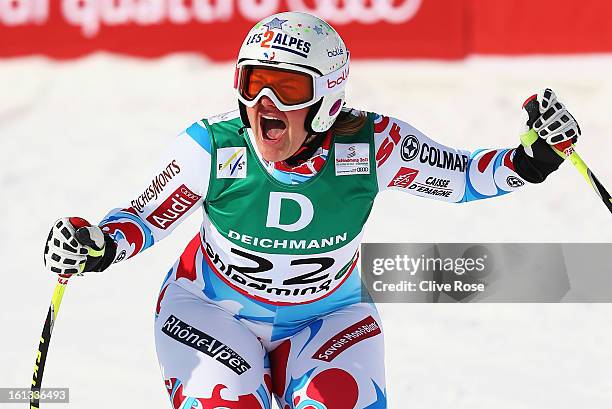 Marion Rolland of France reacts in the finish area after posting the fastest time in the Women's Downhill during the Alpine FIS Ski World...