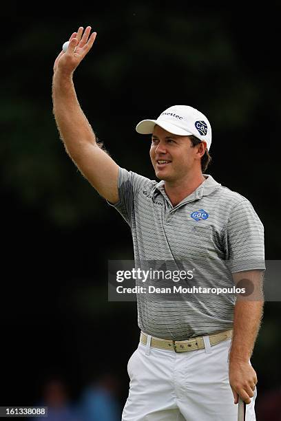 Richard Sterne of South Africa celebrates after winning the Joburg Open at Royal Johannesburg and Kensington Golf Club on February10, 2013 in...