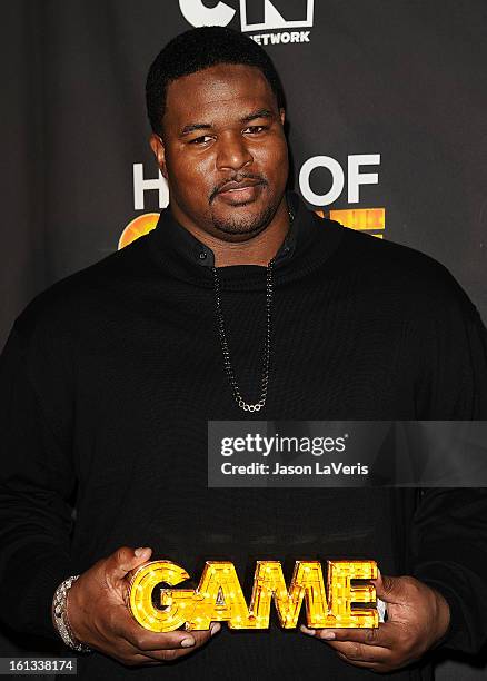 Player Bryant Mckinnie poses in the press room at Cartoon Network's 3rd annual Hall Of Game Awards at Barker Hangar on February 9, 2013 in Santa...