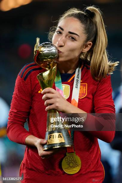 Olga Carmona of Spain and Real Madrid poses with the trophy after winning the FIFA Women's World Cup Australia & New Zealand 2023 Final match...