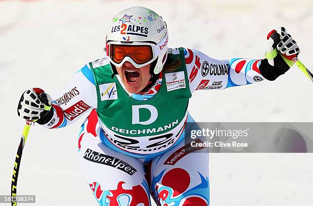 Marion Rolland of France reacts in the finish area after posting the fastest time in the Women's Downhill during the Alpine FIS Ski World...