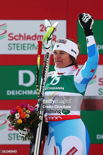 Marion Rolland of France celebrates at the flower ceremony after winning the Women's Downhill during the Alpine FIS Ski World Championships on...