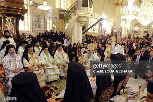 Greek Orthodox leader Yuhanna X Yazigi sits during his enthronement at the Holy Cross Church as the Greek Orthodox Patriarch of Antioch and All the...