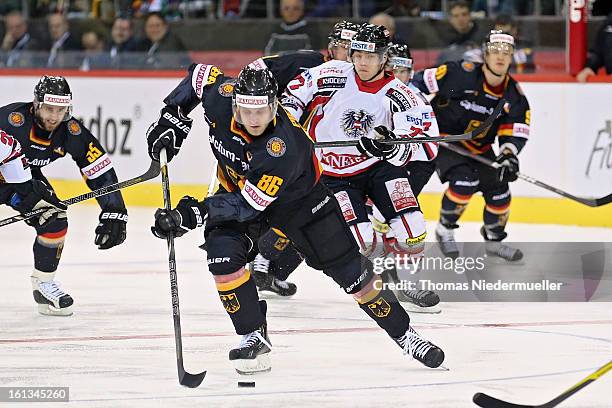 Daniel Pietta of Germany in action during the Olympic Icehockey Qualifier match between Germany and Austria on February 10, 2013 in...