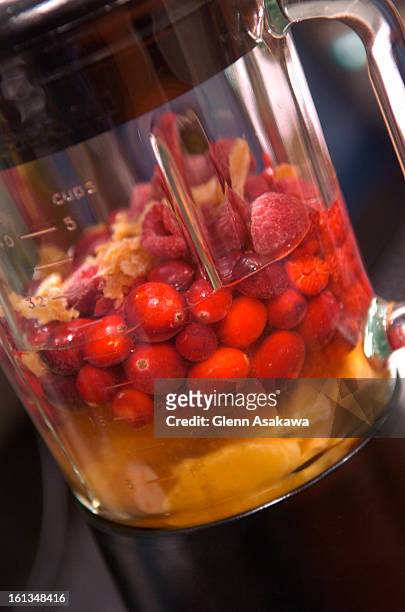 Tablespoons pureed ginger 1 cup cranberries 1 cup frozen raspberries 1 tangerine 1/4 cup candied ginger nuggets 2 cups prepared margarita mix or...