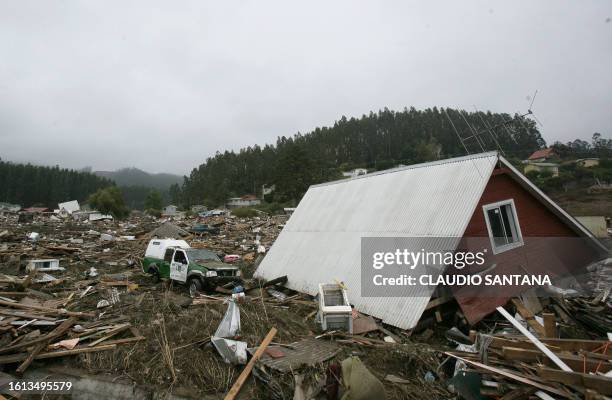 Picture taken on March 1, 2010 showing the massive destruction caused by a tsunami in the Chilean city of Dichato, some 30 km from Concepcion, three...