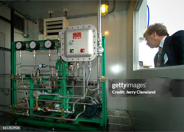 December 14, 2006 - Doug Hooker<cq>, project engineer at the Department of Energy's Golden Field Laboratory, looks through an observation window at a...