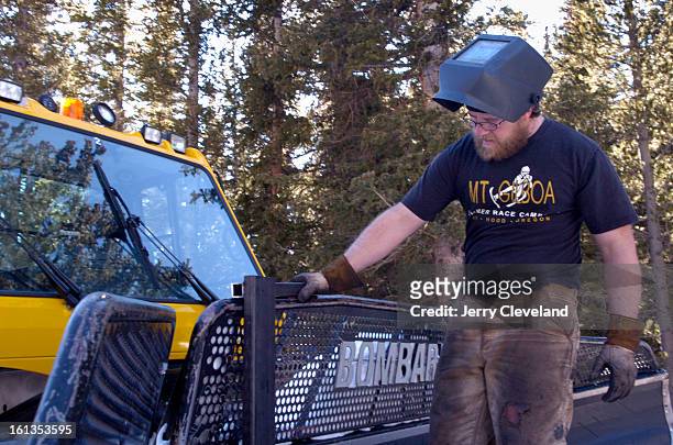 January 23, 2007 - Tony Distrola <cq> works on new equipment for a snowcat at Eclipse Snow Park <cq> at St. Mary's Glacier in Clear Creek County,...