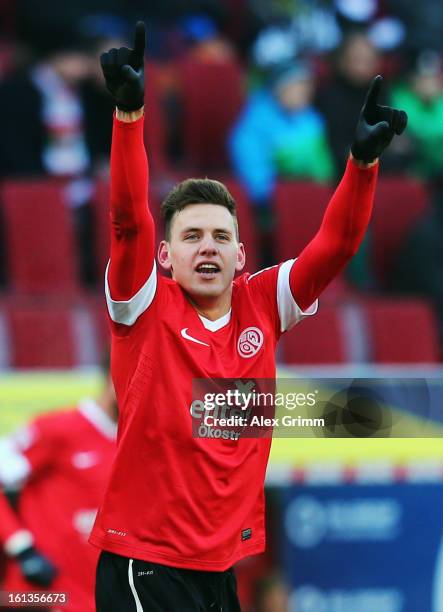 Adam Szalai of Mainz celebrates his team's first goal during the Bundesliga match between FC Augsburg and 1. FSV Mainz 05 at SGL Arena on February...