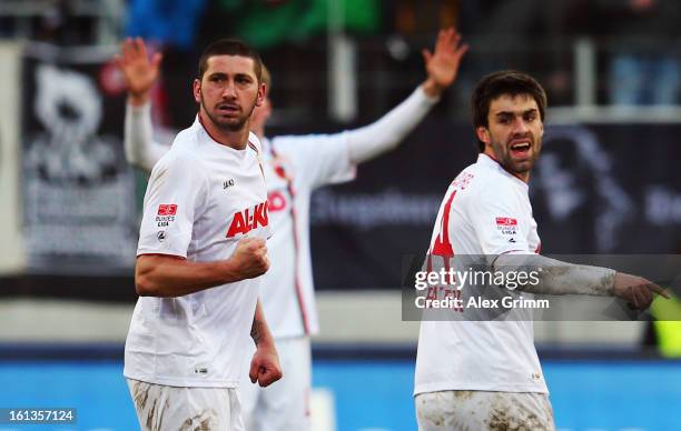 Sascha Moelders of Augsburg celebrates his team's first goal during the Bundesliga match between FC Augsburg and 1. FSV Mainz 05 at SGL Arena on...