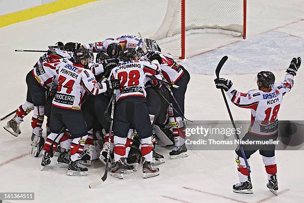 The team of Austria celebrates after the Olympic Icehockey Qualifier match between Germany and Austria on February 10, 2013 in Bietigheim-Bissingen,...