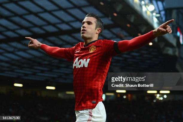 Robin van Persie of Manchester United celebrates scoring his team's second goal during the Barclays Premier League match between Manchester United...