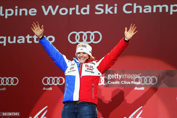 Marion Rolland of France celebrates at the medal ceremony after winning the Women's Downhill during the Alpine FIS Ski World Championships on...