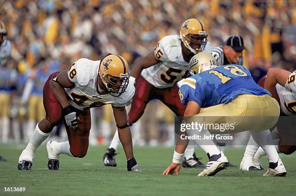 Terrell Suggs of the Arizona State Sun Devils lines up across from Mike Seidman of the UCLA Bruins during the Pac-10 Conference football game at the...