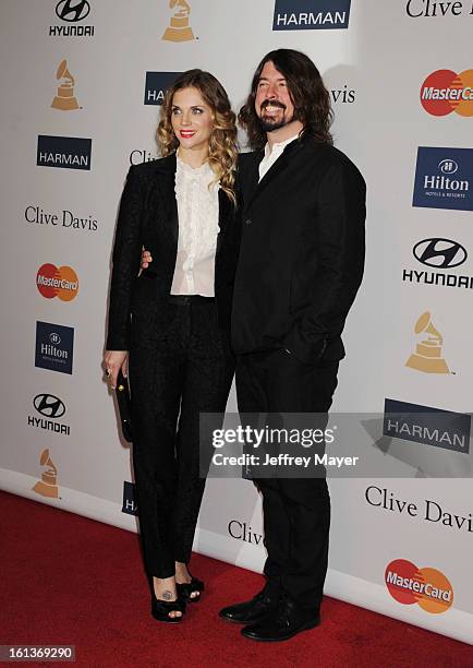 Musician Dave Grohl and wife Jordyn Grohl arrive at the The 55th Annual GRAMMY Awards - Pre-GRAMMY Gala And Salute To Industry Icons Honoring L.A....