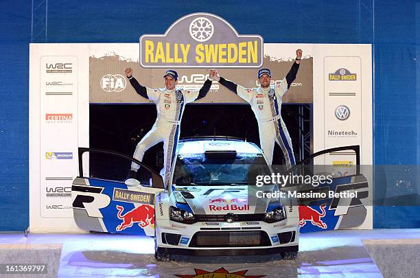 Sebastien Ogier of France and Julien Ingrassia of France celebrate their victory in the final podium during Day Three of the WRC Sweden on February...