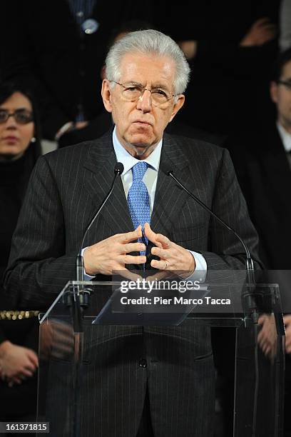 Italian Prime Minister Mario Monti delivers a speech during a meeting with young people at Franco Parenti theater on February 10, 2013 in Milan,...