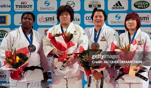 Cuba's second-placed Idalys Ortiz, Japan's first-placed Tachimoto Megumi and third placed Korea's Kim Jiyoun, and Korea's Kim Eun Gyeong pose with...