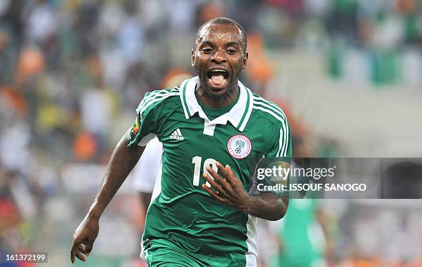 Nigeria's forward Sunday Mba celebrates after scoring the opening goal against Burkina Faso during the 2013 African Cup of Nations final football...