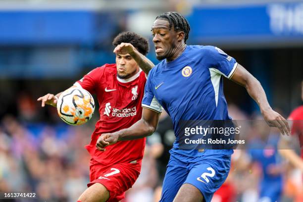 Luis Diaz of Liverpool and Axel Disasi of Chelsea during the Premier League match between Chelsea FC and Liverpool FC at Stamford Bridge on August...