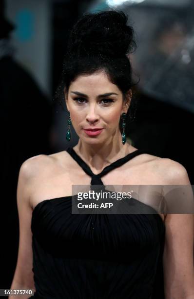 Comedian Sarah Silverman poses on the red carpet upon arrival to attend the annual BAFTA British Academy Film Awards at the Royal Opera House in...
