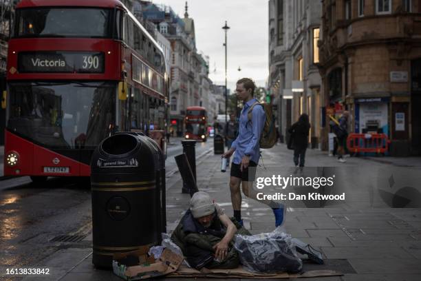 Rough sleeper outside Oxford Street underground station on August 14, 2023 in London, England. The 1.2 mile stretch, one of London’s premier shopping...