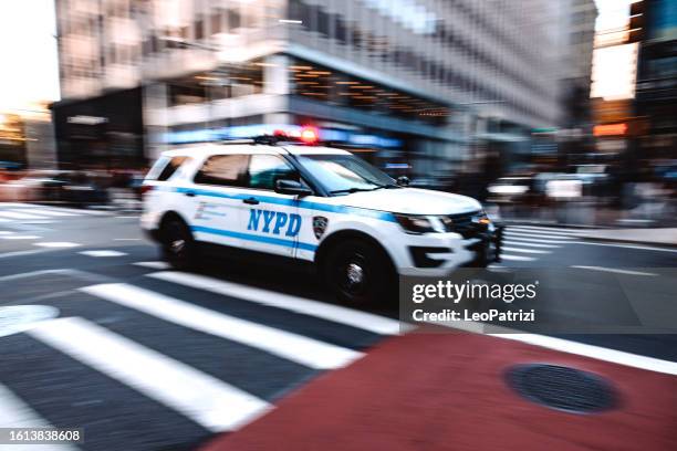 nypd responding to a call - nypd transit stock pictures, royalty-free photos & images