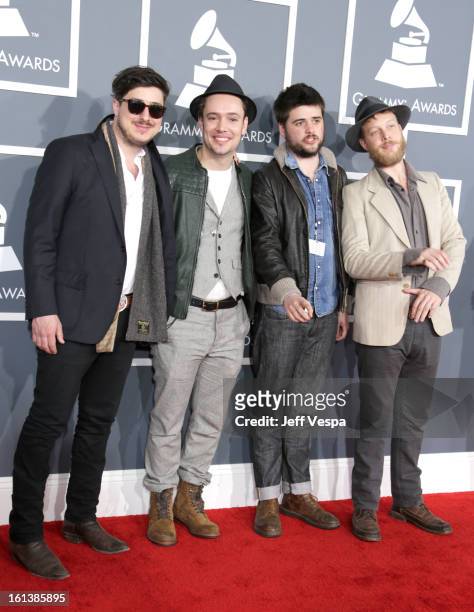 Musicians Marcus Mumford, Ben Lovett, Country Winston-Marshall, and Ted Dwane of Mumford & Sons attend the 55th Annual GRAMMY Awards at STAPLES...