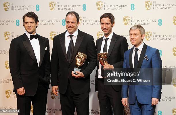 Simon Chinn and Malik Bendjelloul , winners of the Documentry award for "Searching For Sugar Man", pose in the press room with presenters Henry...